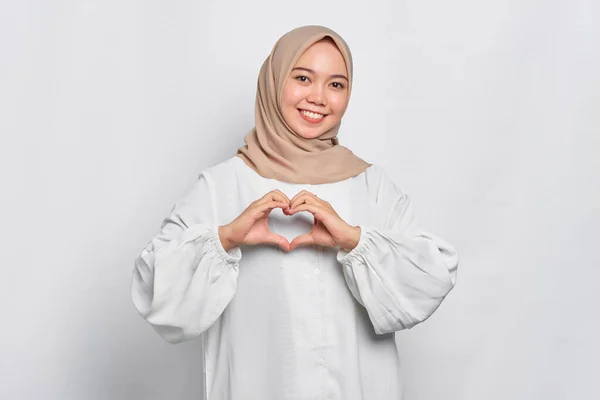 Portrait Smiling Asian Muslim Woman Showing Heart Gesture Isolated White — Stock Photo, Image