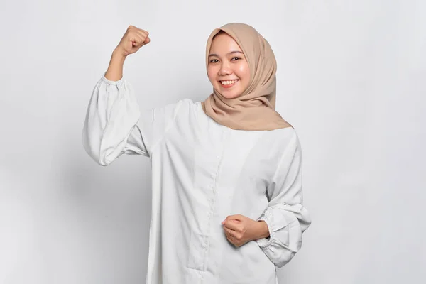 Smiling Asian Muslim Woman Raises Arms Shows Muscle Isolated White — Stock Photo, Image