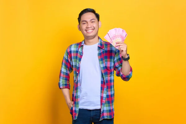 Smiling Young Asian Man Plaid Shirt Holding Money Banknotes Looking — Stock Photo, Image