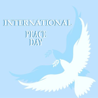 Uluslararası Barış Günü 'nün olduğu tebrik kartı. Gagasında bir dal olan güvercin siluetleri var. 