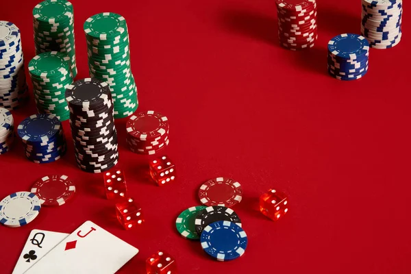 Two cards and chips on a red background. Big bet of game money. Cards - the lady and the jack. Your distribution at the table — Stock Photo, Image