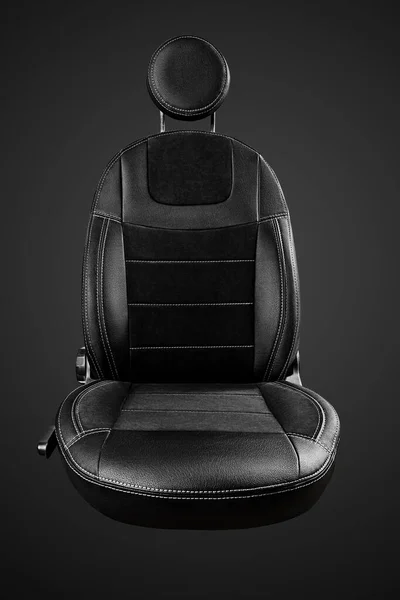 Comfortable driver car seat with round headrest isolated on black background — Zdjęcie stockowe
