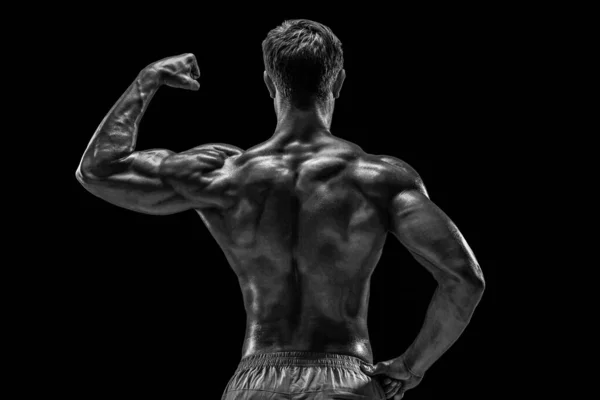Sterke Athletic Man Fitness Model Poseren Rugspieren Triceps Zwarte Achtergrond — Stockfoto