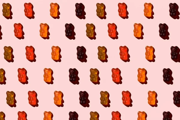 Фото Барвистих Желе Ведмедів Світлому Пастельному Рожевому Фоні Вид Зверху — стокове фото