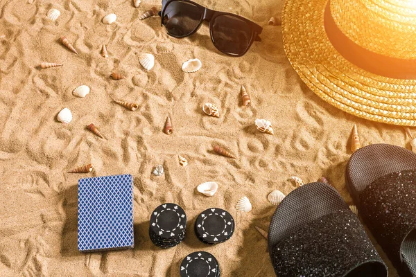 Beachpoker Chips Cards Sand Seashells Sunglasses Flip Flops Top View — Zdjęcie stockowe