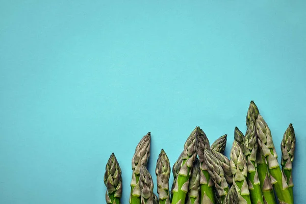 Edible Green Sprigs Asparagus Isolated Blue Background Fresh Vegetables Top — 图库照片