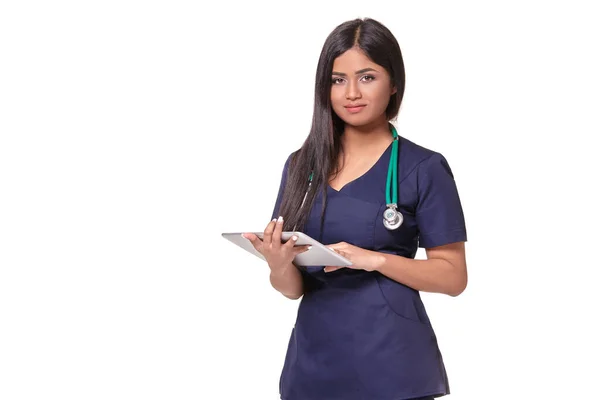 Charming Doctor Stethoscope Looking Camera Medical History Her Hands Isolated — Foto de Stock