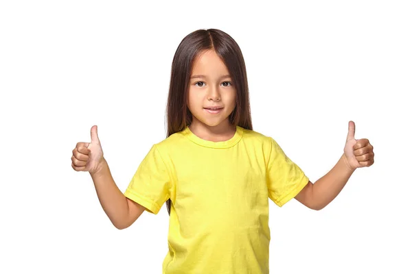 Girl Yellow Shirt Shows Her Hands Thumbs Isolated White Background — ストック写真