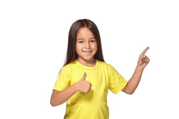 Girl Yellow Shirt Shows Her Hands Thumbs Isolated White Background — ストック写真