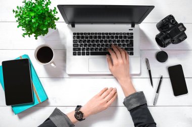 Overhead view of businesswoman working at computer in office. Place for your text. Ideal for blog. flat lay on white background