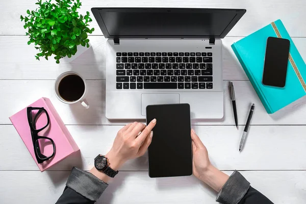 Overhead view of businesswoman working at computer in office. Place for your text. Ideal for blog. flat lay on white background