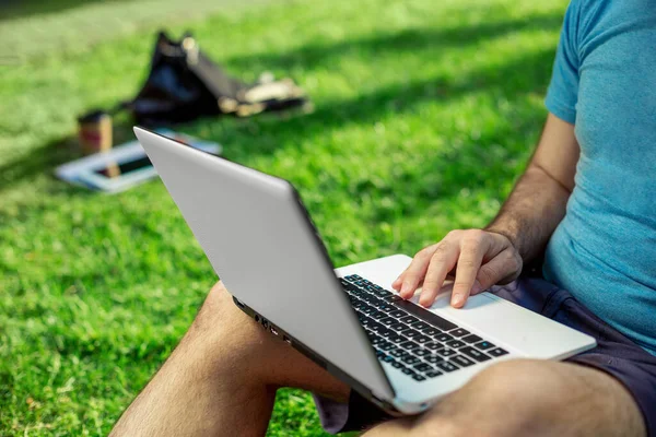 Cropped Shot Man Using Laptop Blank Screen While Sitting Green — Stockfoto