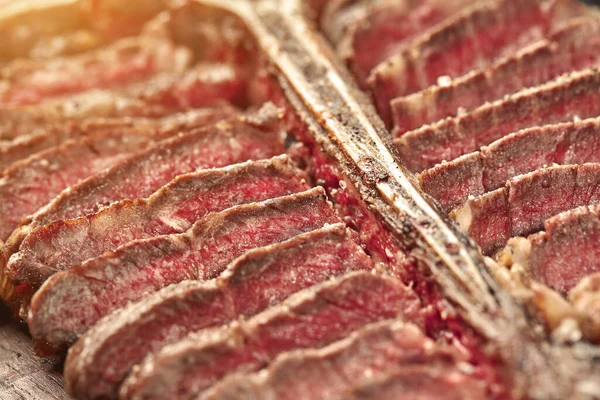 Sliced Steak Bone Lying Wooden Board Close Top View Still — Fotografia de Stock