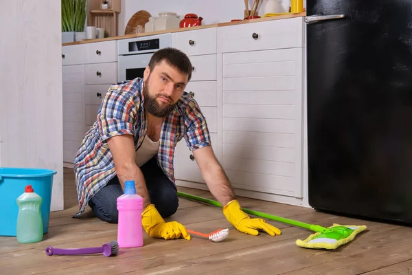 Housecleaning Concept Caucasian Handsome Young Bearded Man Checkered Shirt Sits — Stock Photo, Image