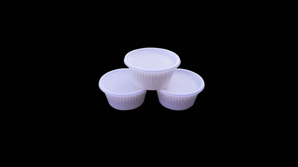 Три Чашки Десерта Сложенные Друг Друге Изолированы Черном Фоне Обрезкой — стоковое фото