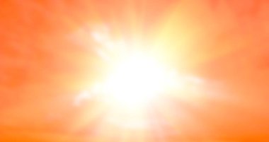 Turuncu gökyüzü ve doğal beyaz bulutlar. Arka planda parlak altın bir güneş ışığı var.