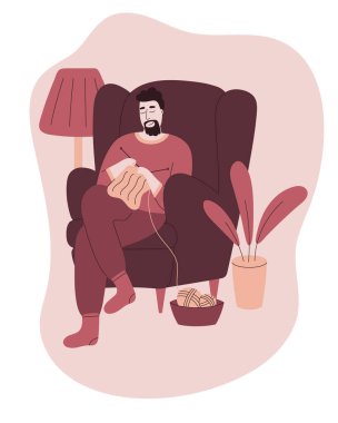 Şırıngalarla örgü ören ve koltukta oturan adam. Ev atmosferinde rahat bir zaman. Rahatla ve evde kal. Makaleler, kartlar vs. için modern düz biçim.