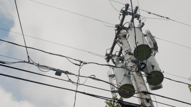 A power line pole with transformers on it. Typical of the United States — Stock Video