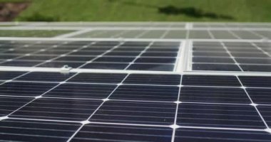 Solar panels are installed on the roof of the residential building. Energy independence concept