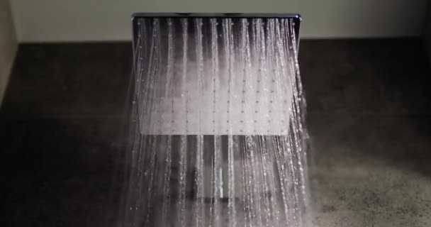 Jets of water flow from the square shower head, slow motion video — Stock Video