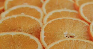 JSlider 4k shot: Uicy portakal dilimleri yan yana yatar.