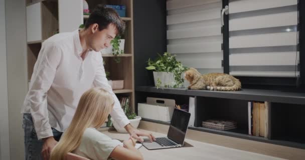Older Brother Helps His Sister Homework Cat Sitting Next Him — Vídeos de Stock