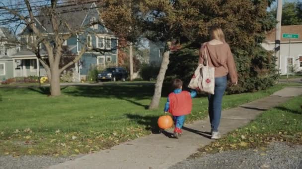 Woman Leads Hand Little Boy Costume Candy Halloween — Wideo stockowe