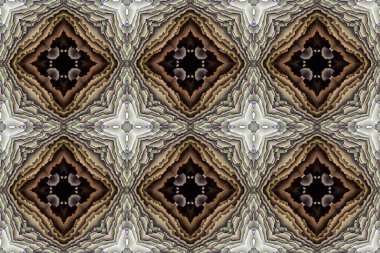 Sonsuz tekrarlanabilir simetrik elementlerle kompleks grafik tasarımı. Katmanlı bir yapı yaratan yeni ve alışılmadık bir teknik. Değişen yüksekliklerde üst üste binen katmanlar izlenimi veriyor..