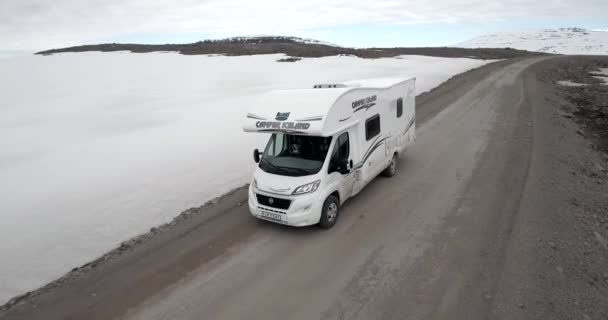 Close Aerial Camper Driving Empty Snowy Road — стоковое видео