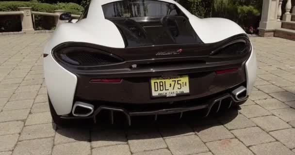 Aerial White Mclaren Supercar Driving Neighborhood — Stock Video