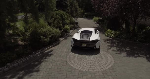 Aerial Mclaren Leaving Driveway Large Home — Stock Video
