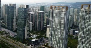 Songdo Central Park, Incheon, Güney Kore yakınlarındaki gökdelenler.