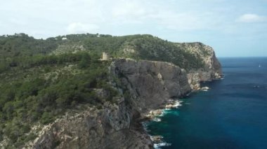 Cliff defense tower Northern area of Ibiza Sant Miguel beach.