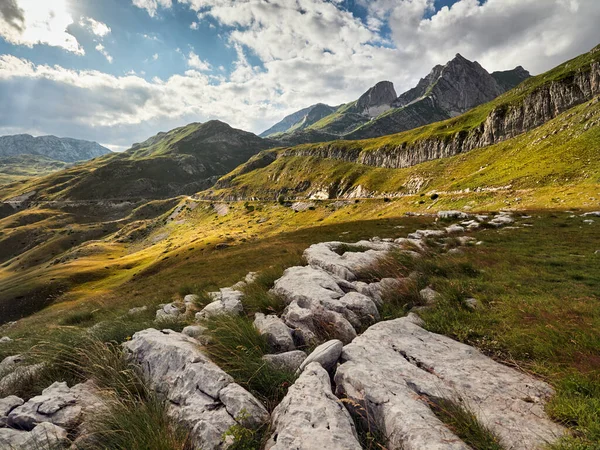 The slopes of the Durmitor mountains lit by the rays of the sun. Mountain landscape of the National Park in Montenegro.