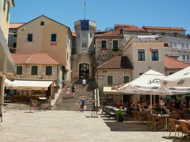 Herceg Novi, Montenegro, July 16, 2022: Nikola Djurkovic Square with the clock tower.