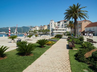 Tivat, Montenegro, July 16, 2022: The seafront promenade in the port city in the Bay of Kotor.