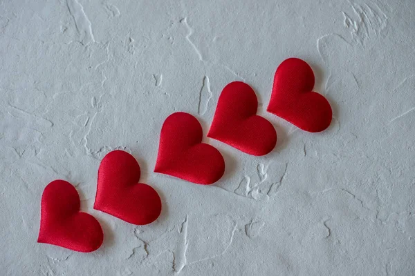 heart symbol, diagonally on a light background top view