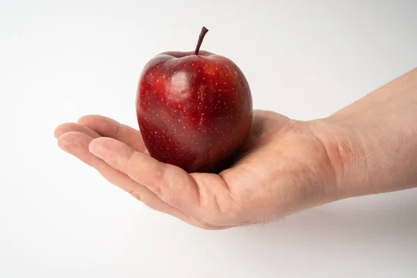 Mand Hånd Holder Rødt Æble Hvid Baggrund - Stock-foto