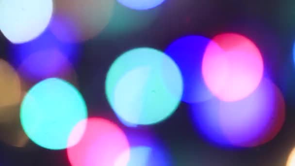 Θολή Χριστούγεννα μυστηριώδη πολύχρωμα φώτα τρεμοπαίζει έντονα. — Αρχείο Βίντεο