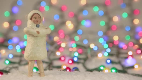 Újévi képernyővédő Hóleány a háttérben a karácsonyi fények. 