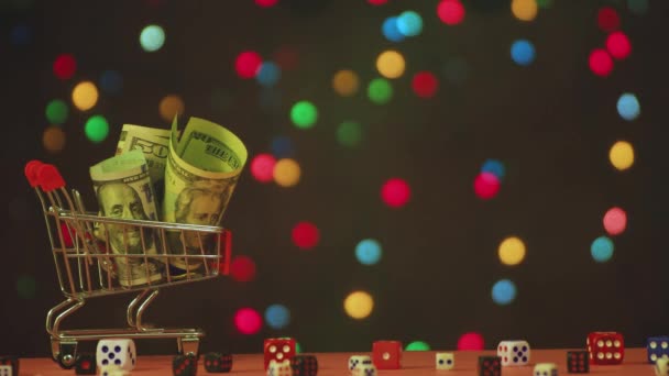 New Years video screensaver dollars in a basket and dice. — 图库视频影像
