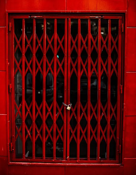 locked red blood metal entry door