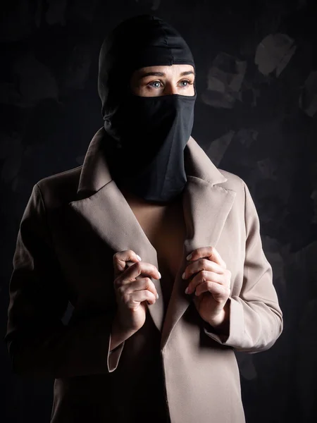 Portrait Girl Black Balaclava Beige Coat Shot Studio Dark Background — Stock Fotó