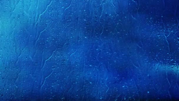 Close Rainwater Flowing Glass Rain Drops Falling Dark Blue Background — Stockvideo