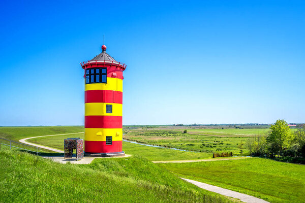 Pilsum Lighthouse in Greetsiel, Krummhoern, North Sea, Germany 