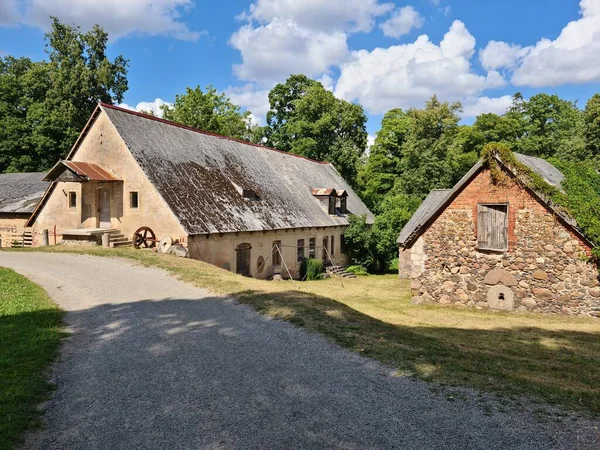Old Buildings Water Mill Shore Lake Latvian Village Jaunpils Summer — Stock Photo, Image