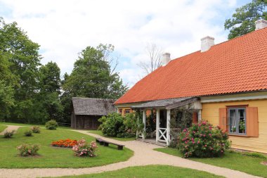 Wooden house with a red tiled roof in the Latvian city of Sigulda on July 26, 2019.