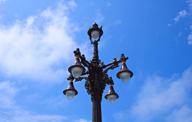 Old street lamps on the streets of the city as a reminder of years gone by.