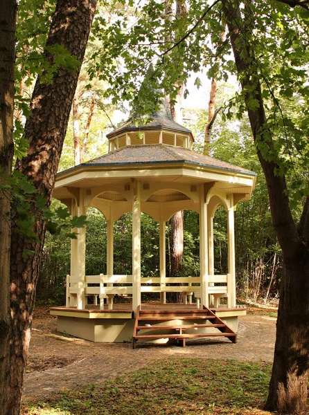 Cozy exotic wooden pavilion in a city park to enjoy your personal time.
