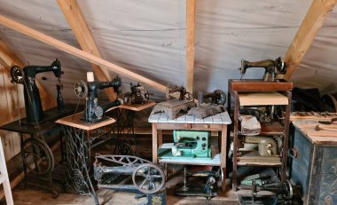 Collection of various old sewing machines in Guest House near the Latvian village of Barbele in the spring of 2022.